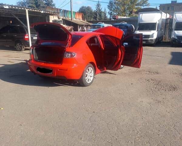 Красный Мазда 3, объемом двигателя 1.6 л и пробегом 154 тыс. км за 6700 $, фото 1 на Automoto.ua