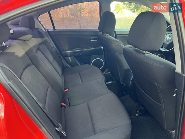 Красный Мазда 3, объемом двигателя 1.6 л и пробегом 230 тыс. км за 5500 $, фото 9 на Automoto.ua