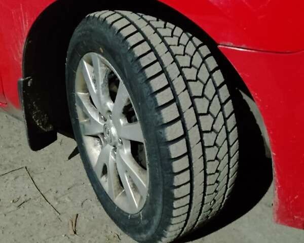 Красный Мазда 3, объемом двигателя 1.6 л и пробегом 167 тыс. км за 5999 $, фото 4 на Automoto.ua