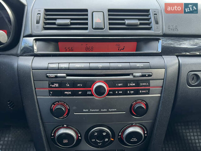 Красный Мазда 3, объемом двигателя 1.6 л и пробегом 230 тыс. км за 5500 $, фото 16 на Automoto.ua