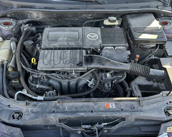 Красный Мазда 3, объемом двигателя 1.6 л и пробегом 192 тыс. км за 5500 $, фото 18 на Automoto.ua