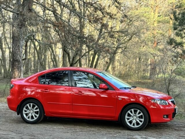 Красный Мазда 3, объемом двигателя 1.6 л и пробегом 230 тыс. км за 5500 $, фото 1 на Automoto.ua