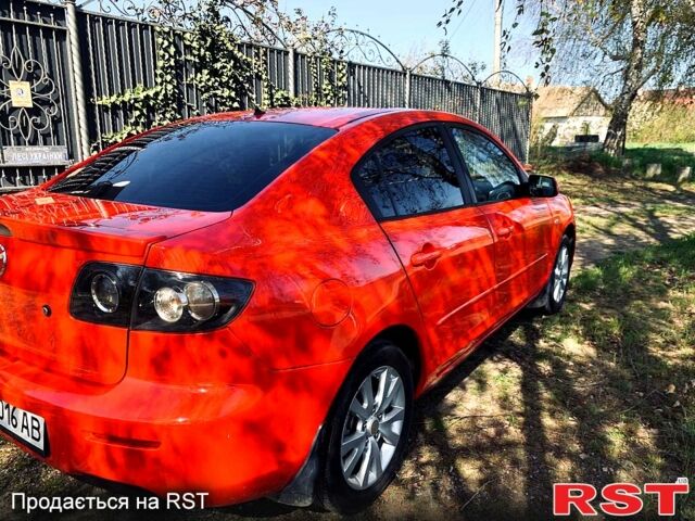 Красный Мазда 3, объемом двигателя 1.6 л и пробегом 199 тыс. км за 5800 $, фото 2 на Automoto.ua