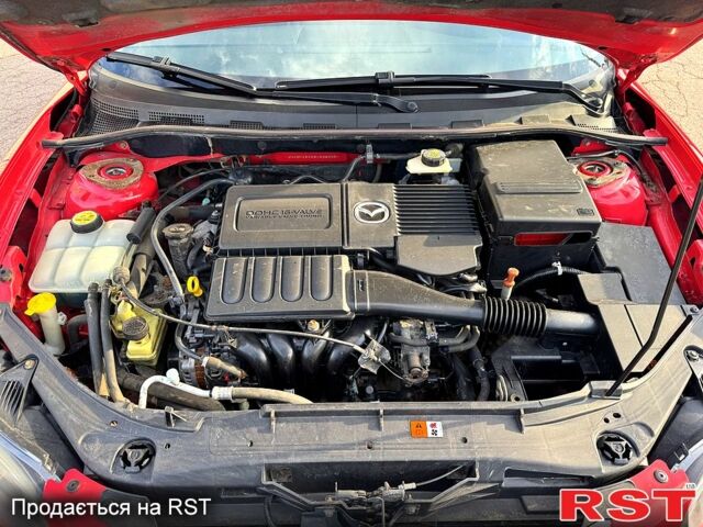 Красный Мазда 3, объемом двигателя 1.6 л и пробегом 154 тыс. км за 6700 $, фото 10 на Automoto.ua