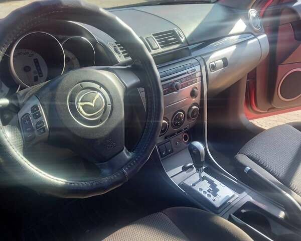 Красный Мазда 3, объемом двигателя 1.6 л и пробегом 154 тыс. км за 6700 $, фото 16 на Automoto.ua