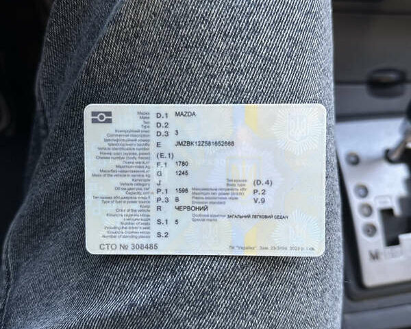 Красный Мазда 3, объемом двигателя 1.6 л и пробегом 192 тыс. км за 5500 $, фото 15 на Automoto.ua