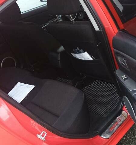 Красный Мазда 3, объемом двигателя 1.6 л и пробегом 161 тыс. км за 5450 $, фото 10 на Automoto.ua