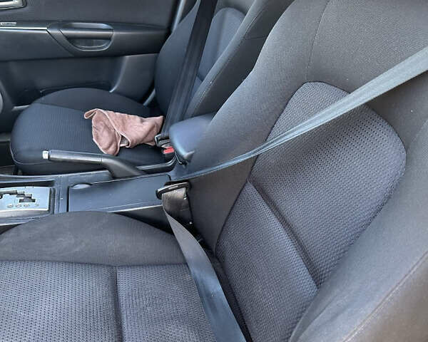 Красный Мазда 3, объемом двигателя 1.6 л и пробегом 192 тыс. км за 5500 $, фото 12 на Automoto.ua