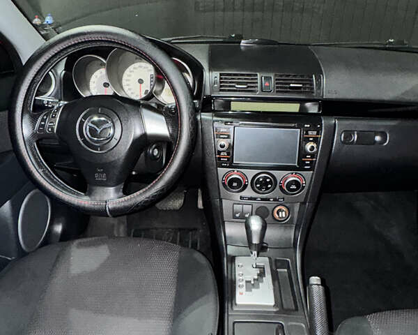 Красный Мазда 3, объемом двигателя 1.6 л и пробегом 234 тыс. км за 3999 $, фото 14 на Automoto.ua