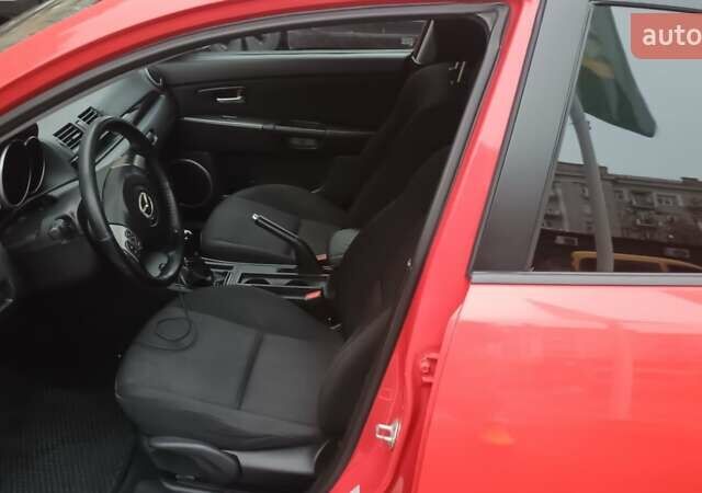 Красный Мазда 3, объемом двигателя 1.6 л и пробегом 161 тыс. км за 5450 $, фото 11 на Automoto.ua