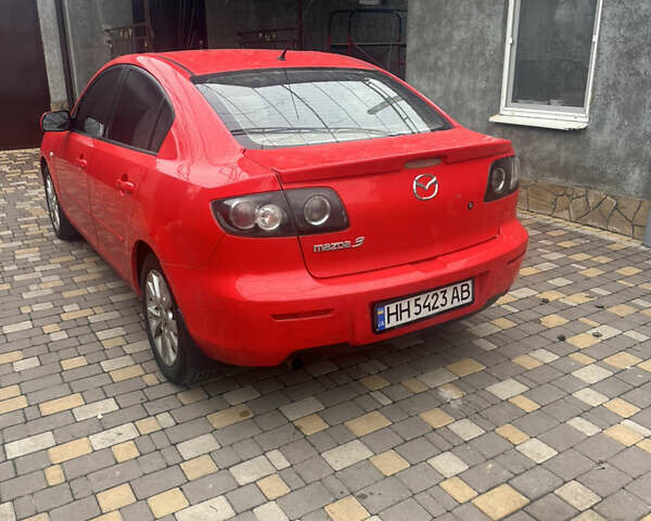 Красный Мазда 3, объемом двигателя 1.6 л и пробегом 310 тыс. км за 4500 $, фото 5 на Automoto.ua