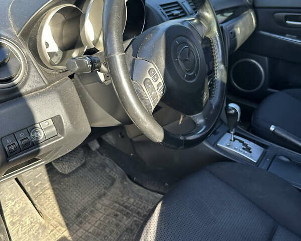 Красный Мазда 3, объемом двигателя 1.6 л и пробегом 192 тыс. км за 5500 $, фото 11 на Automoto.ua