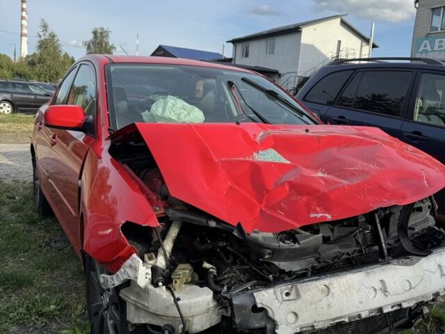 Красный Мазда 3, объемом двигателя 2 л и пробегом 295 тыс. км за 3000 $, фото 2 на Automoto.ua