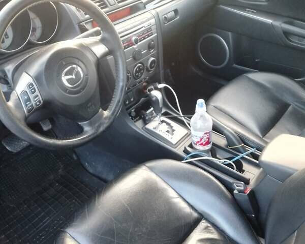 Красный Мазда 3, объемом двигателя 1.6 л и пробегом 167 тыс. км за 5999 $, фото 2 на Automoto.ua