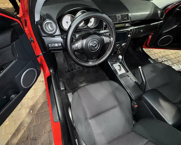 Красный Мазда 3, объемом двигателя 1.6 л и пробегом 234 тыс. км за 3999 $, фото 11 на Automoto.ua