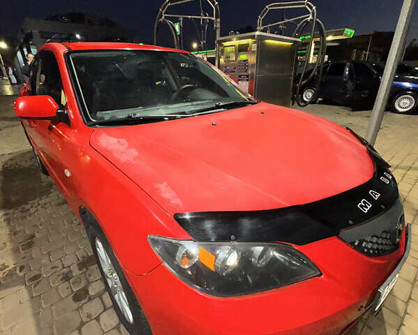 Красный Мазда 3, объемом двигателя 1.6 л и пробегом 234 тыс. км за 3999 $, фото 2 на Automoto.ua