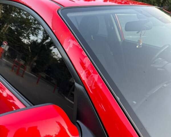 Красный Мазда 3, объемом двигателя 1.6 л и пробегом 131 тыс. км за 6600 $, фото 12 на Automoto.ua