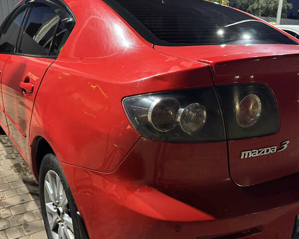 Красный Мазда 3, объемом двигателя 1.6 л и пробегом 234 тыс. км за 3999 $, фото 6 на Automoto.ua