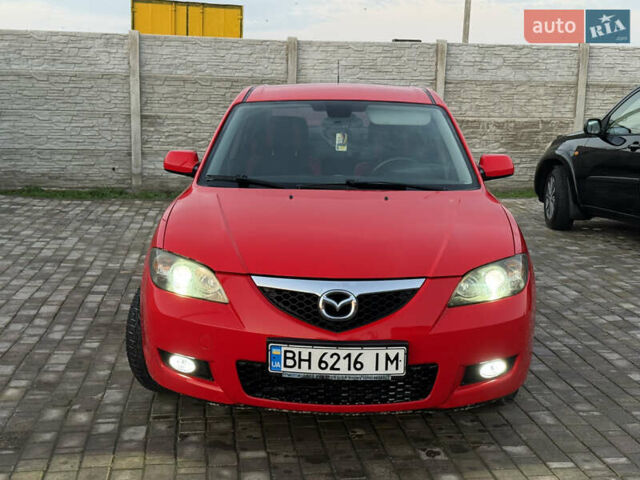 Красный Мазда 3, объемом двигателя 1.6 л и пробегом 147 тыс. км за 4300 $, фото 1 на Automoto.ua