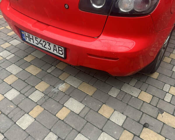Красный Мазда 3, объемом двигателя 1.6 л и пробегом 310 тыс. км за 4500 $, фото 7 на Automoto.ua