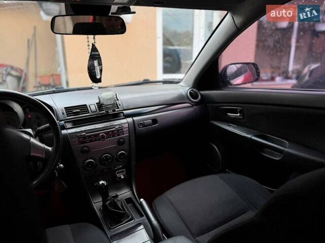 Червоний Мазда 3, об'ємом двигуна 1.6 л та пробігом 218 тис. км за 6000 $, фото 12 на Automoto.ua