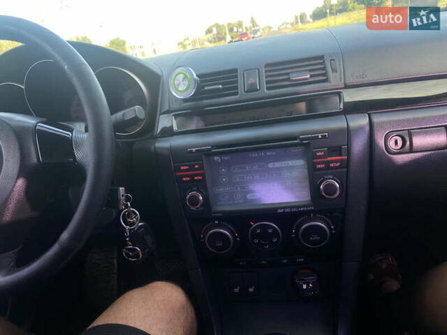 Красный Мазда 3, объемом двигателя 2 л и пробегом 244 тыс. км за 6800 $, фото 13 на Automoto.ua