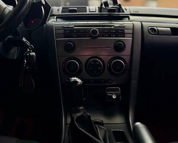 Червоний Мазда 3, об'ємом двигуна 1.6 л та пробігом 218 тис. км за 6000 $, фото 11 на Automoto.ua