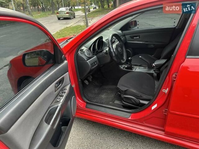 Красный Мазда 3, объемом двигателя 2 л и пробегом 300 тыс. км за 3900 $, фото 12 на Automoto.ua