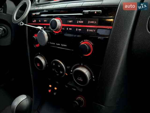 Красный Мазда 3, объемом двигателя 2 л и пробегом 205 тыс. км за 5900 $, фото 38 на Automoto.ua