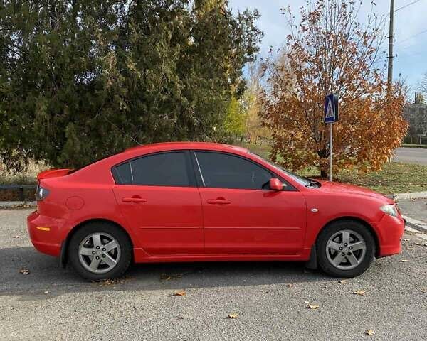 Красный Мазда 3, объемом двигателя 2 л и пробегом 160 тыс. км за 5300 $, фото 10 на Automoto.ua