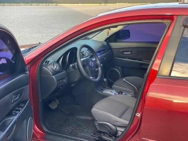 Красный Мазда 3, объемом двигателя 2 л и пробегом 220 тыс. км за 6700 $, фото 2 на Automoto.ua