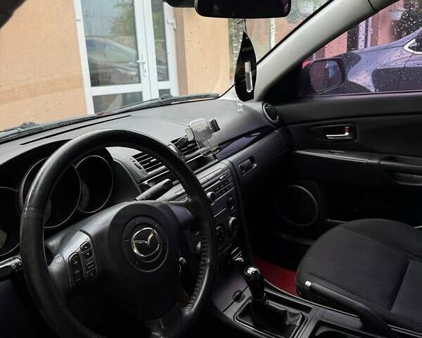 Червоний Мазда 3, об'ємом двигуна 1.6 л та пробігом 218 тис. км за 6000 $, фото 9 на Automoto.ua