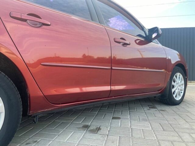 Красный Мазда 3, объемом двигателя 2 л и пробегом 220 тыс. км за 6700 $, фото 5 на Automoto.ua