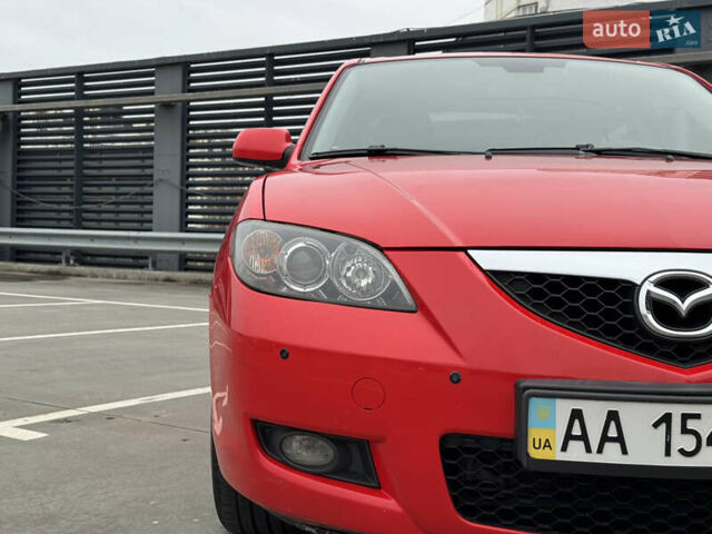 Красный Мазда 3, объемом двигателя 2 л и пробегом 205 тыс. км за 5900 $, фото 16 на Automoto.ua