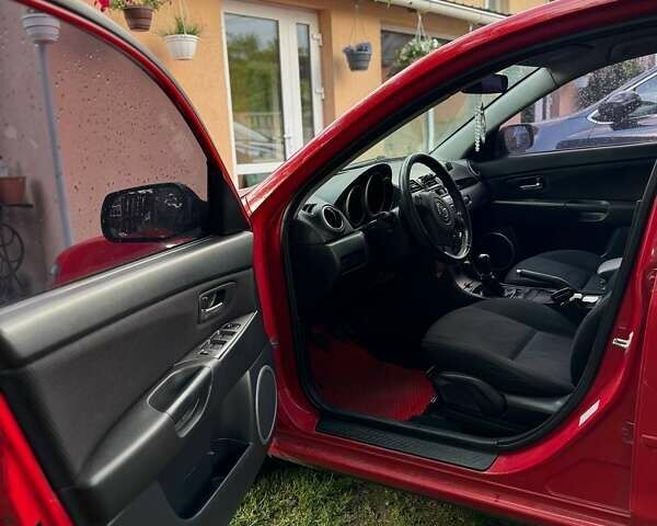 Червоний Мазда 3, об'ємом двигуна 1.6 л та пробігом 218 тис. км за 6000 $, фото 7 на Automoto.ua