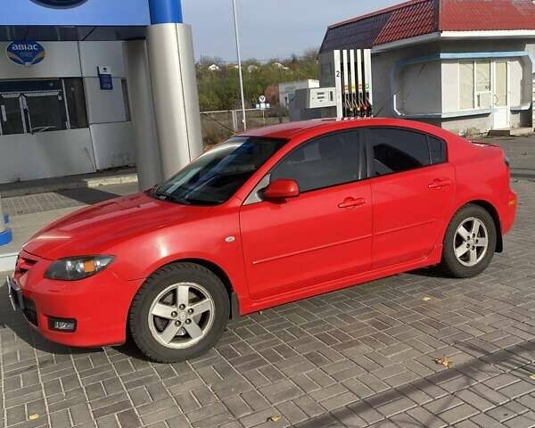 Красный Мазда 3, объемом двигателя 2 л и пробегом 160 тыс. км за 5300 $, фото 1 на Automoto.ua
