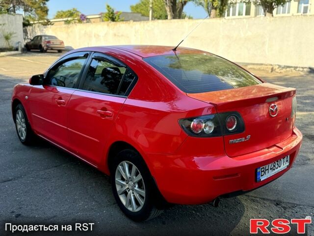 Красный Мазда 3, объемом двигателя 2 л и пробегом 200 тыс. км за 5400 $, фото 1 на Automoto.ua