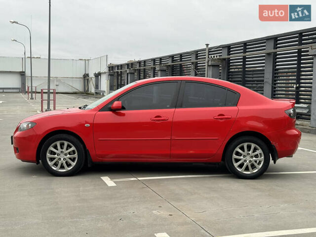 Красный Мазда 3, объемом двигателя 2 л и пробегом 205 тыс. км за 5400 $, фото 7 на Automoto.ua