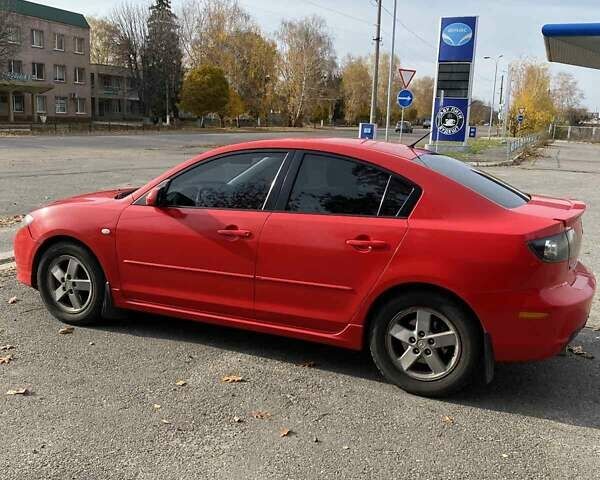Красный Мазда 3, объемом двигателя 2 л и пробегом 160 тыс. км за 5300 $, фото 4 на Automoto.ua