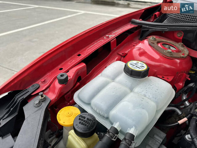 Красный Мазда 3, объемом двигателя 2 л и пробегом 205 тыс. км за 5400 $, фото 79 на Automoto.ua