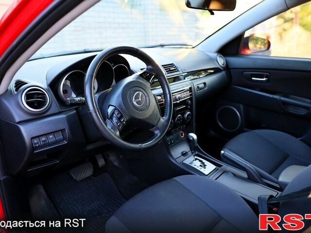 Красный Мазда 3, объемом двигателя 2 л и пробегом 203 тыс. км за 5600 $, фото 2 на Automoto.ua