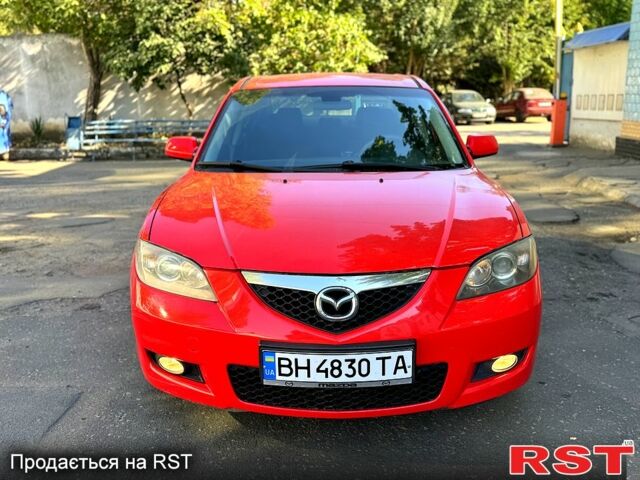 Красный Мазда 3, объемом двигателя 2 л и пробегом 200 тыс. км за 5400 $, фото 3 на Automoto.ua