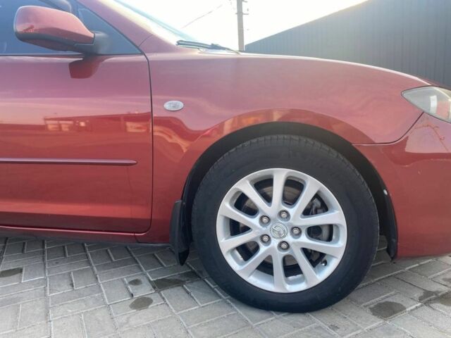 Красный Мазда 3, объемом двигателя 2 л и пробегом 220 тыс. км за 6700 $, фото 7 на Automoto.ua