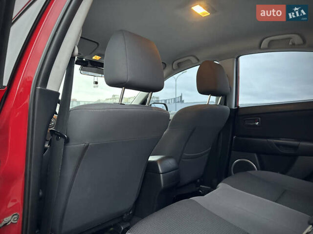 Красный Мазда 3, объемом двигателя 2 л и пробегом 205 тыс. км за 5900 $, фото 28 на Automoto.ua