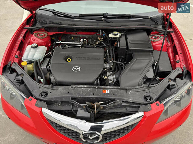 Красный Мазда 3, объемом двигателя 2 л и пробегом 205 тыс. км за 5400 $, фото 78 на Automoto.ua