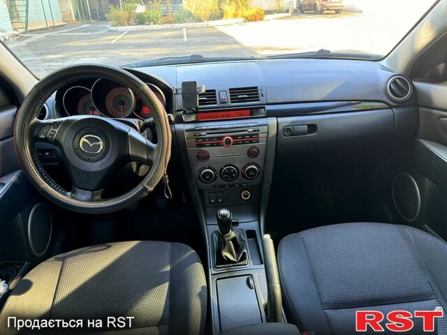 Красный Мазда 3, объемом двигателя 2 л и пробегом 200 тыс. км за 5400 $, фото 5 на Automoto.ua