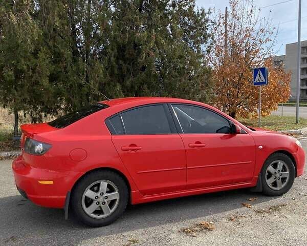 Красный Мазда 3, объемом двигателя 2 л и пробегом 160 тыс. км за 5300 $, фото 3 на Automoto.ua