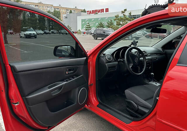 Красный Мазда 3, объемом двигателя 1.6 л и пробегом 129 тыс. км за 5800 $, фото 9 на Automoto.ua