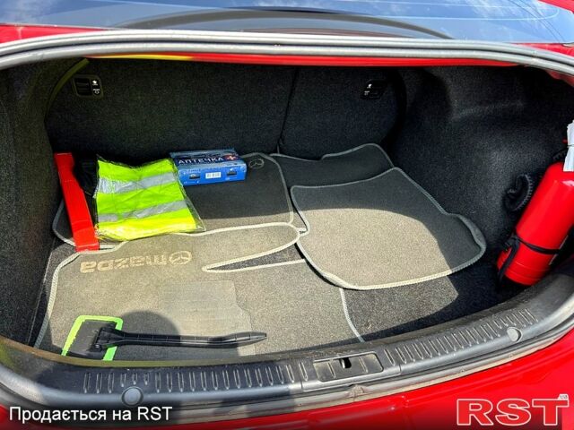 Красный Мазда 3, объемом двигателя 1.6 л и пробегом 130 тыс. км за 6500 $, фото 7 на Automoto.ua