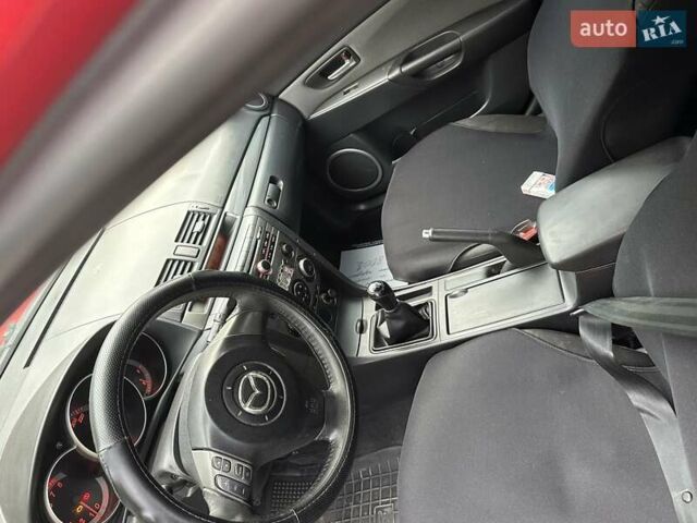 Красный Мазда 3, объемом двигателя 2 л и пробегом 300 тыс. км за 3900 $, фото 14 на Automoto.ua
